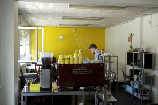 Serving coffee from the window of a co-working space on Hietalahdenkatu.