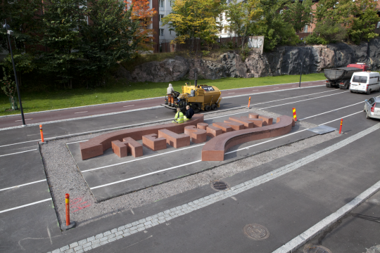 Baana skate sculpture surrounded by a moat that the city dug in response to citizen complaints about noises