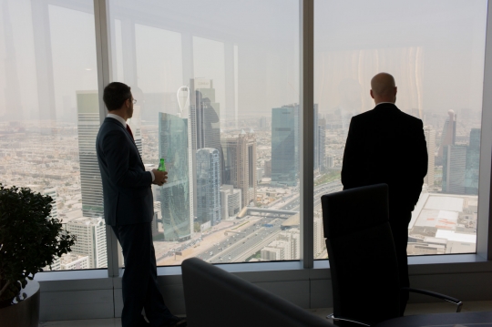 Noah and Justin survey Dubai from the PM's offices.