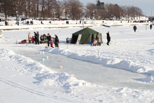 Temporary cafe set up on the ice... and curling sheet!