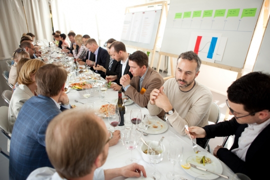 After the presentations concluded we moved all of the chairs out of the way and set up a big table to continue the discussion during a casual lunch.